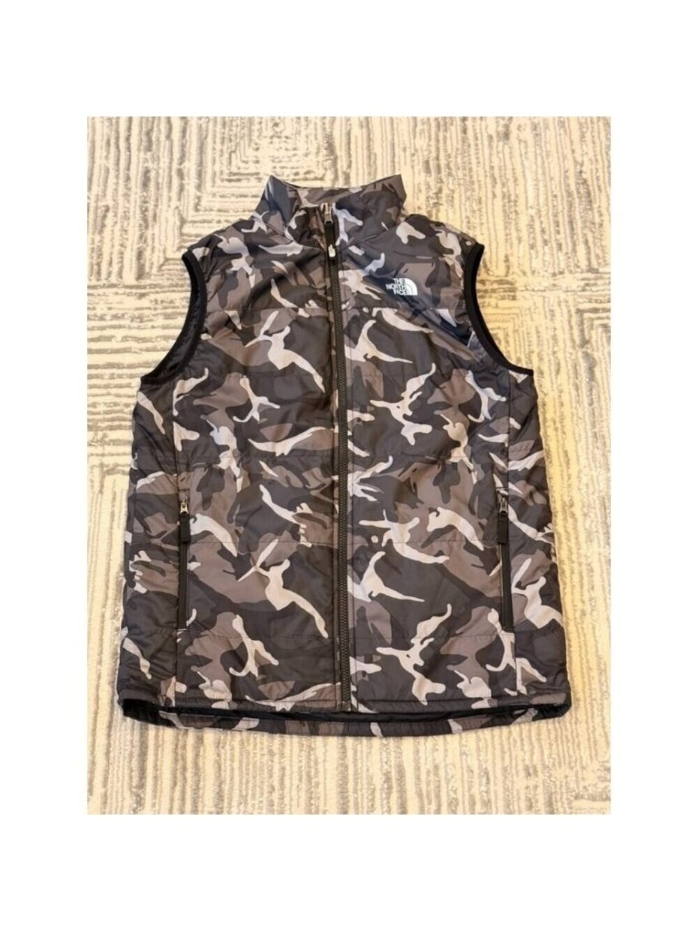The North Face boys youth XL 18/20 black/gray/white camouflage puffer vest